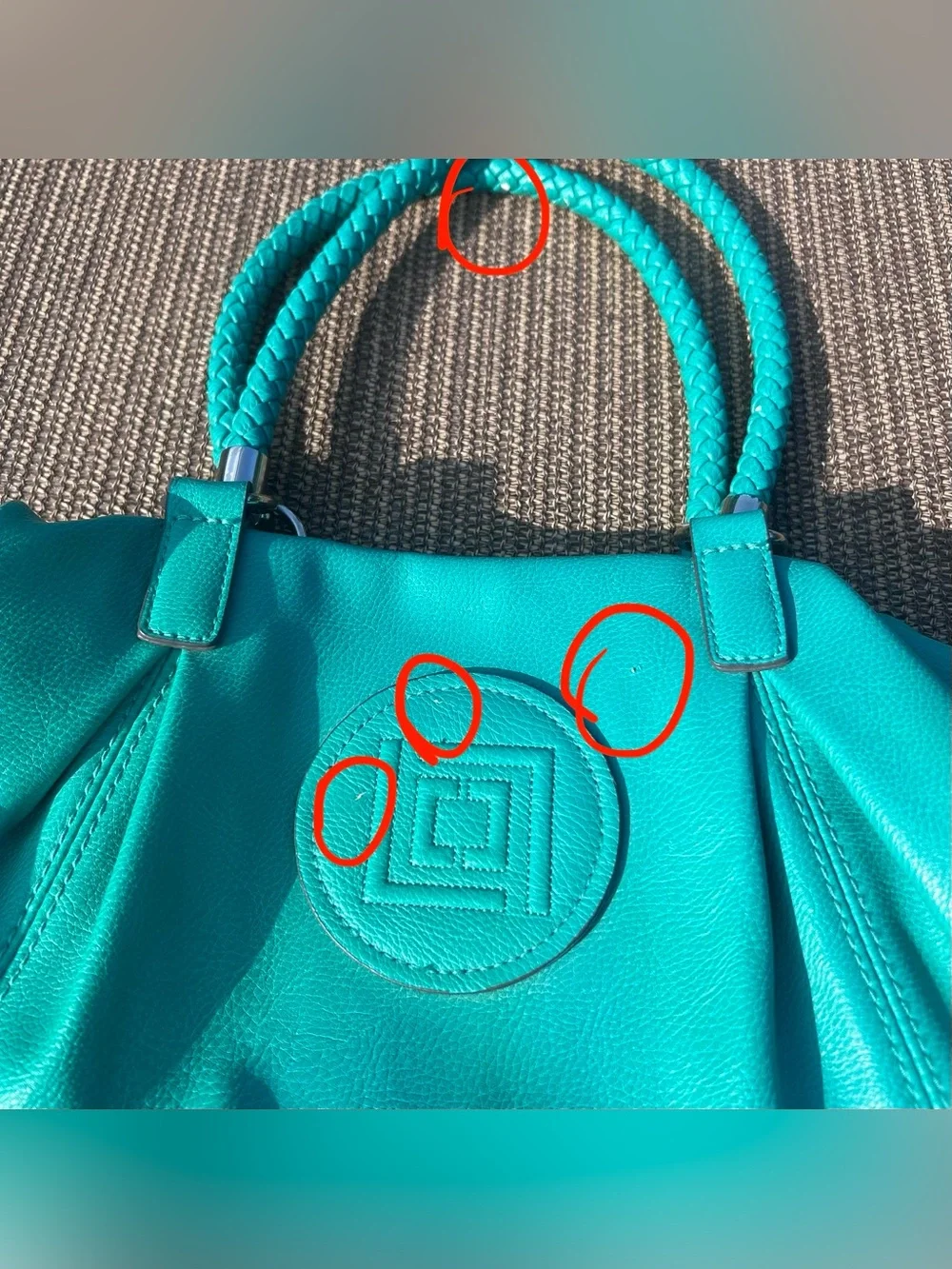 Liz Claiborne teal leather handbag with braided handles and tassel
